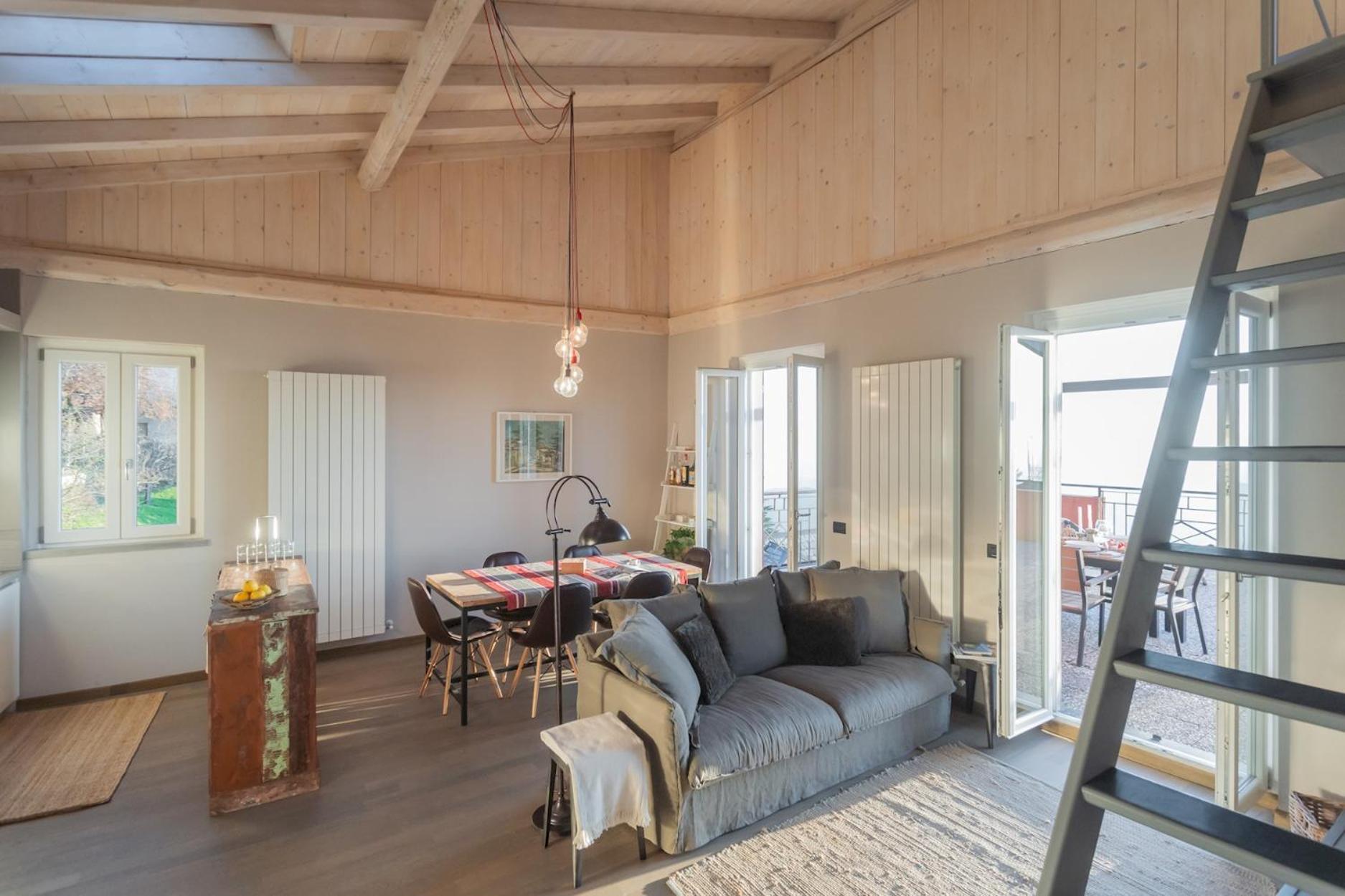 Sunset Terrace Loft - View On By Rent Apartment