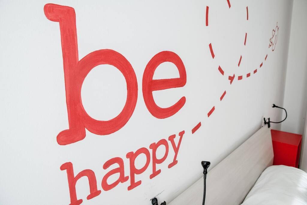 Be Happy - The House Of Travelers