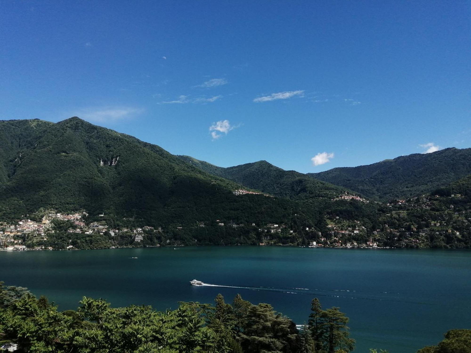 Between Mountains And * Carate Urio