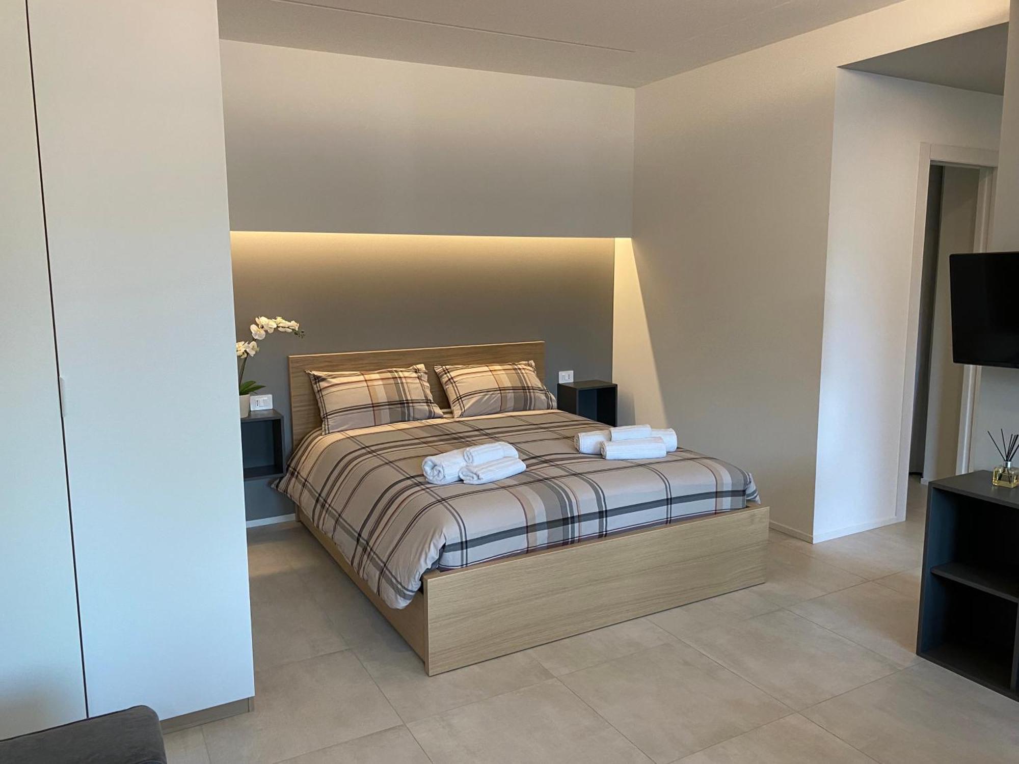 Apartment New Residenza Le Essenze - I 7 Laghi *