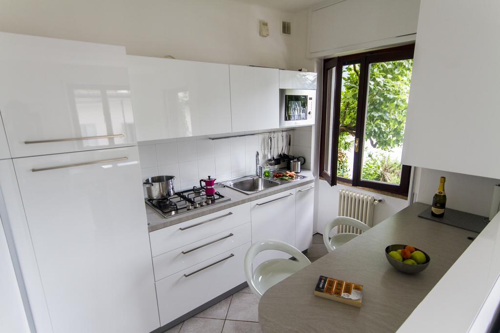 Apartment Palm Bay Garden Sala Comacina