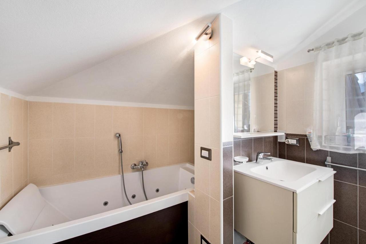 Holiday home Penthouse Colonno